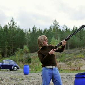 FIG> 019KI (TM). Father and son clay pigeon shooting day Särkikangas sandpit,  Year: 1975 (2015) Location: Vilppula