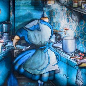 Alice in Wonderland in her kitchen