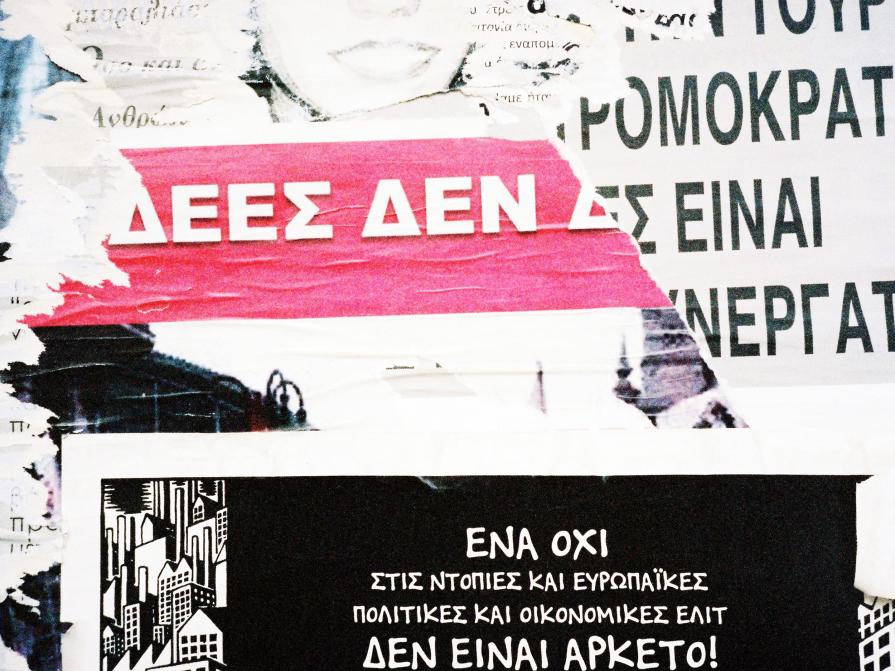 Land You Refugee (demonstration poster photographed in exarchia)