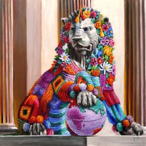 Serious lion statue, yarn bombed