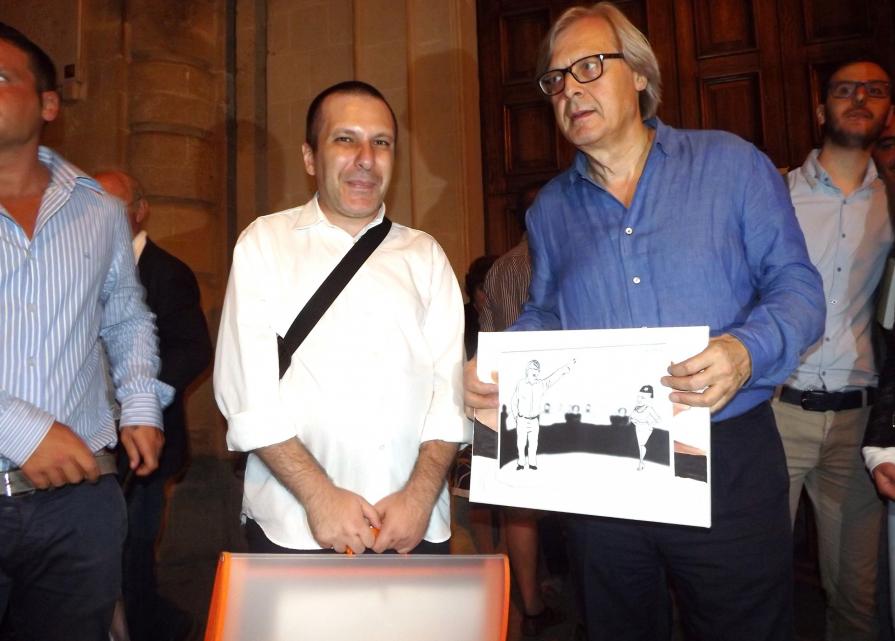 incontro con Vittorio Sgarbi durante la serata d'inaugurazione della mostra dedicata a Carlo Levi dove ho donato un mio dipinto e tre vignette