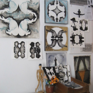 Studio wall with silhouettes