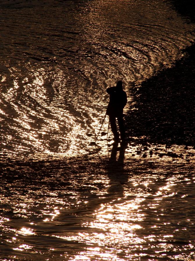 Il fotografo nell'Adige