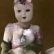 Cat in doll