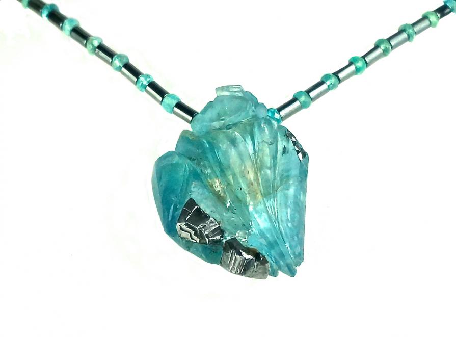 necklace: fluorite with hematite, on topaz and hematite