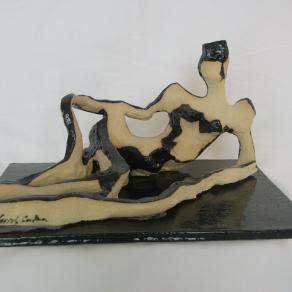 reclining model white porcelain with black glaze