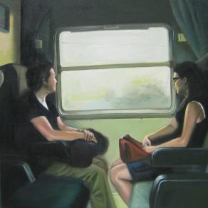 Mom and daughter traveling in a train