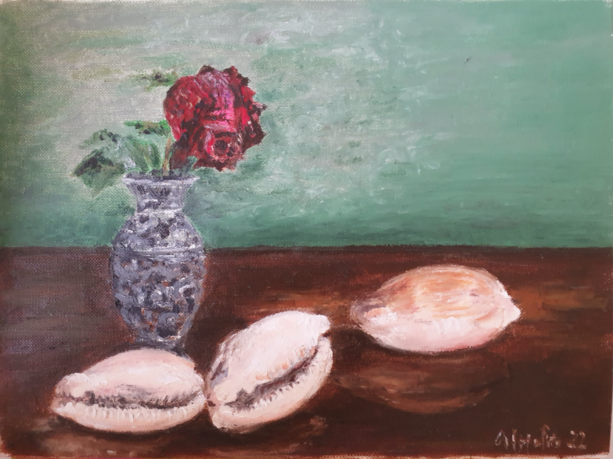 Still life with a dried rose