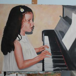 ritratto di bimba al piano