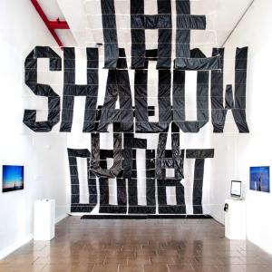 'The Shadow of a Doubt' from the project 'Severe Clear'; installation view of airplane banner