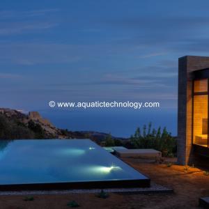 Overflow pool and spa, glass tile mosaics, fire feature, vanishing edge, infinity edge