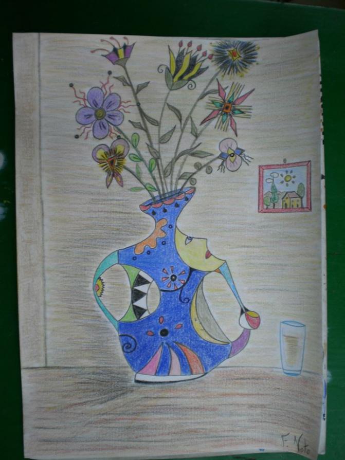 Blue artistic pot with flowers